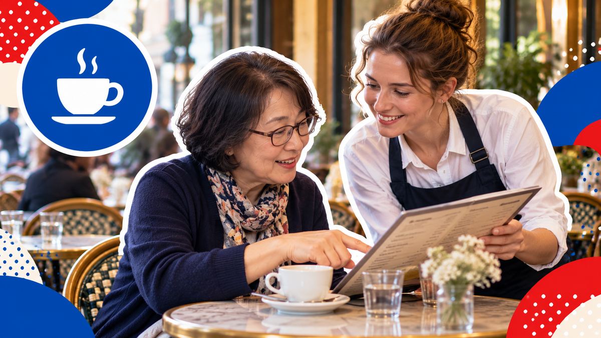 パリのカフェで、メニューを指さしながら店員に注文する日本人の女性